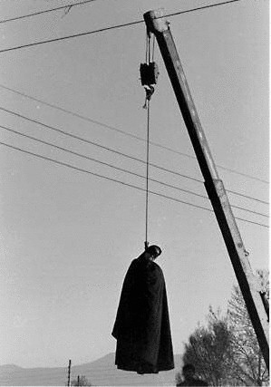 Total Prohibition. Public hanging, Iran, 2001. 30 year old woman put to death for "drug trafficking".